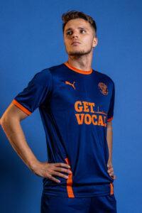Blackpool FC player in Get Vocal kit