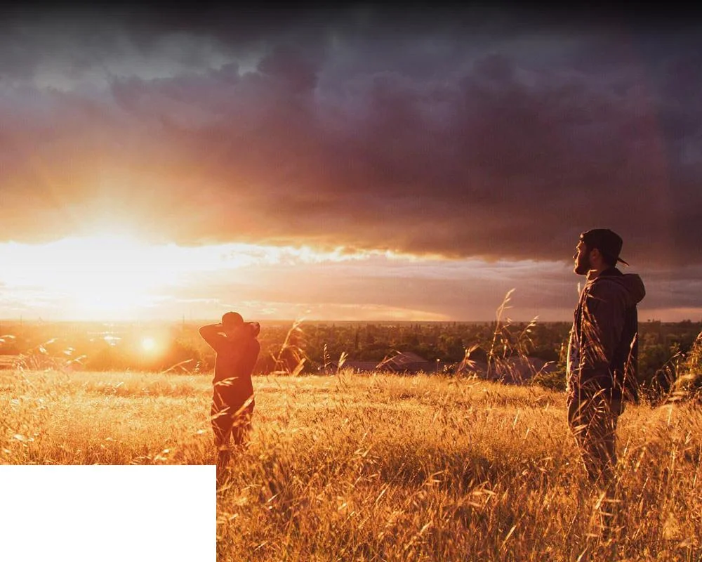 young people looking towards the sun